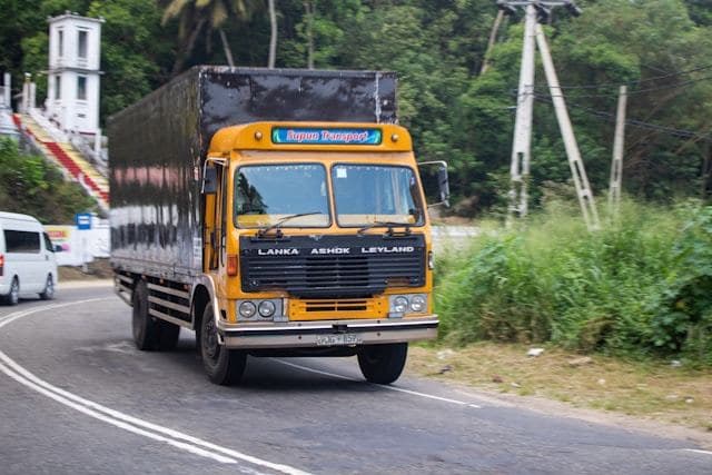 Om Sai Cargo Corporation Indian truck on the highway